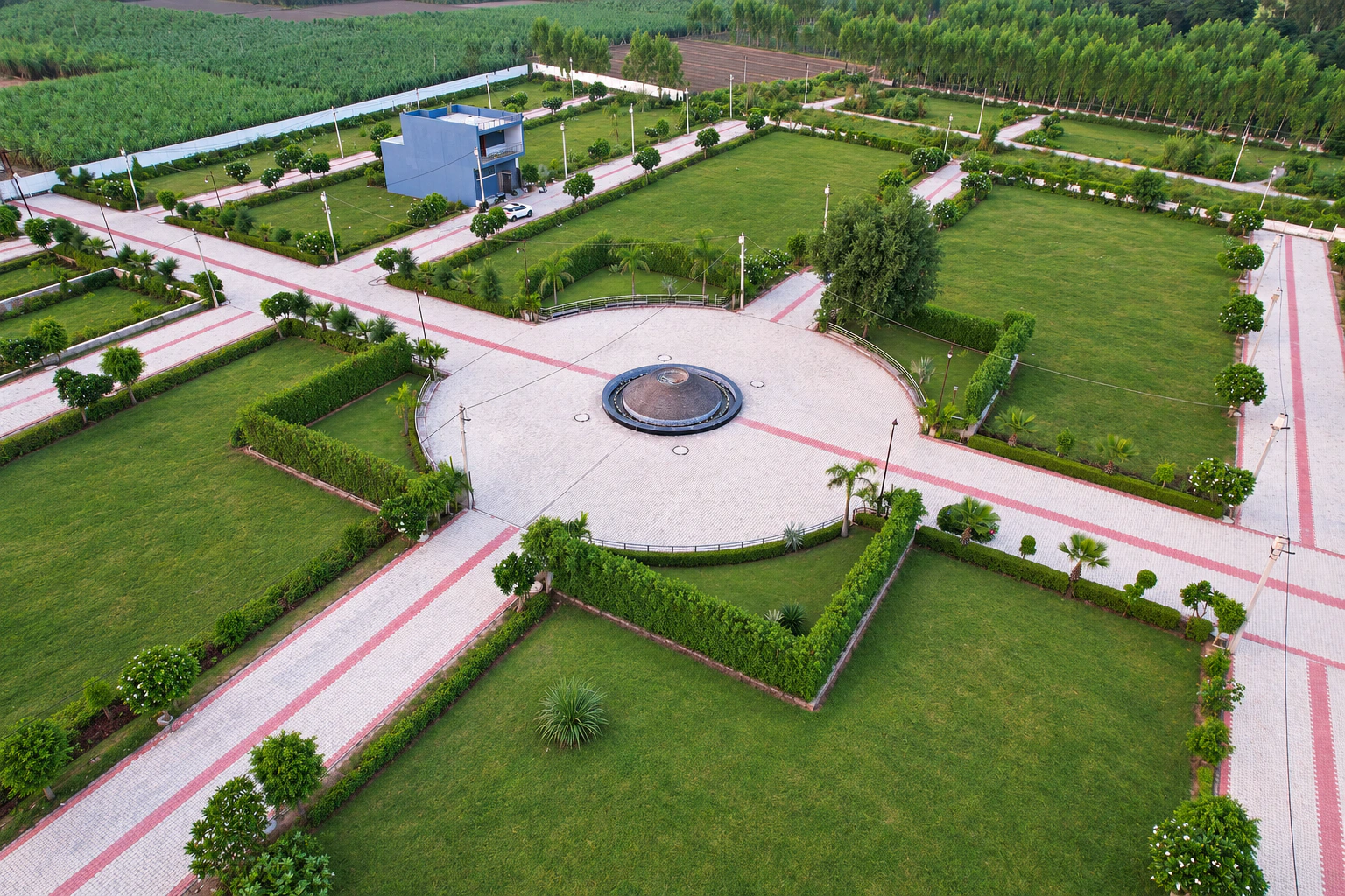 Aerial view of River Green Society and the lawns around its fountain plaza